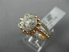 ESTATE LARGE .6CT ROUND & BAGUETTE DIAMOND 14K WHITE & ROSE GOLD FRIENDSHIP RING