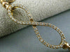 ESTATE .70CT DIAMOND 14KT ROSE GOLD 3D INFINITY FLEXIBLE LOVE BANGLE BRACELET