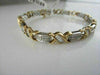ESTATE WIDE 14KT TWO TONE 3.45CTW DIAMOND LOVE BRACELET