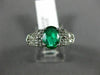 ESTATE 1.21CT DIAMOND & AAA OVAL EMERALD 14KT WHITE GOLD 3D LOVE ENGAGEMENT RING