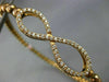 ESTATE .70CT DIAMOND 14KT ROSE GOLD 3D INFINITY FLEXIBLE LOVE BANGLE BRACELET