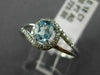 ESTATE .48CT DIAMOND & AAA OVAL CUT AQUAMARINE 14KT WHITE GOLD 3D LOVE KNOT RING