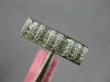 ESTATE .60CT DIAMOND 18KT WHITE GOLD ROUND & PRINCESS INVISIBLE ANNIVERSARY RING