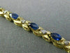 ESTATE 1.21CT DIAMOND & AAA MARQUISE SAPPHIRE 14KT TWO TONE GOLD X LOVE BRACELET