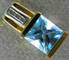 ESTATE 1.46CT DIAMOND & AAA BLUE TOPAZ 14KT 2 TONE GOLD ROUND & PRINCESS PENDANT