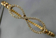 ESTATE .70CT DIAMOND 14KT ROSE GOLD 3D INFINITY FLEXIBLE LOVE BANGLE BRACELET