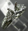 ESTATE .92CT DIAMOND ROUND & BAGUETTE 18KT WHITE GOLD SEMI MOUNT ENGAGMENT RING