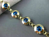 ESTATE 14KT YELLOW GOLD & ROUND BLUE CRYSTAL FLORAL EVIL EYE BRACELET #22954