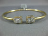 .79CT DIAMOND 18KT YELLOW GOLD ROUND & BAGUETTE CLUSTER FLEXIBLE BANGLE BRACELET