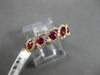 ESTATE WIDE .65CTW DIAMOND & AAA RUBY 14KT ROSE GOLD INFINITY ETOILE FUN RING