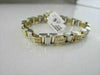 ESTATE WIDE 14K TWO TONE PRINCESS CUT DIAMOND BRACELET