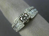ESTATE .90CT ROUND & BAGUETTE DIAMOND 14KT WHITE GOLD FOUR PRONG ENGAGEMENT RING