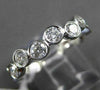 ESTATE .75CT ROUND DIAMOND 14KT WHITE GOLD WAVE BEZEL ETOILE ANNIVERSARY RING