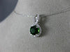 ESTATE 1.20CT DIAMOND & AAA GREEN GARNET 14KT WHITE GOLD ROUND INFINITY PENDANT