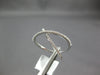 ESTATE WIDE .21CT DIAMOND 18KT WHITE GOLD 3D X LOVE INFINITY FUN RING