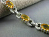 ESTATE 7.10CT DIAMOND & YELLOW SAPPHIRE 14KT WHITE GOLD 3D LOVE TENNIS BRACELET