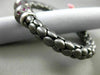 ESTATE 1.20CT RUBY 14KT WHITE & BLACK GOLD 3D FLEXIBLE HAMMERED BANGLE BRACELET