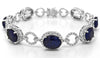 LARGE 25.17CT DIAMOND & AAA SAPPHIRE 18KT WHITE GOLD OVAL & ROUND HALO BRACELET
