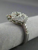 ESTATE 1.04CT ROUND BAGUETTE DIAMOND 18KT WHITE GOLD 3D DOUBLE HEART FLOWER RING