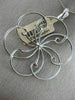 ESTATE LARGE .92CT DIAMOND 14KT WHITE GOLD OPEN FILIGREE FLOWER FLOATING PENDANT