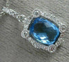 1.70CT DIAMOND & AAA BLUE TOPAZ 14KT WHITE GOLD RECTANGULAR HALO ETOILE PENDANT