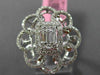 ESTATE LARGE .78CT ROUND & BAGUETTE DIAMOND 18KT WHITE GOLD FLOWER COCKTAIL RING