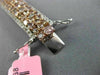 WIDE 22.84CT WHITE & PINK DIAMOND 18KT WHITE & ROSE GOLD CLUSTER TENNIS BRACELET