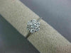 ESTATE .50CT ROUND DIAMOND 14KT WHITE GOLD CLASSIC SEVEN STONE FLOWER LOVE RING