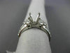 ESTATE .92CT DIAMOND ROUND & BAGUETTE 18KT WHITE GOLD SEMI MOUNT ENGAGMENT RING