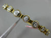 ESTATE .60CT DIAMOND 14K WHITE & YELLOW GOLD 3D 9 STONE FLEXIBLE BANGLE BRACELET