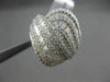 ESTATE 2.15CT BAGUETTE & ROUND DIAMOND 18KT WHITE GOLD INTERTWINNING FUN RING