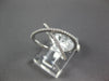 ESTATE WIDE .21CT DIAMOND 18KT WHITE GOLD 3D X LOVE INFINITY FUN RING