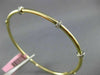ESTATE .30CT DIAMOND 14K WHITE & YELLOW GOLD PAST PRESENT FUTURE BANGLE BRACELET