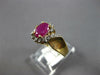 ESTATE 1.10CT DIAMOND & AAA RUBY 14KT YELLOW GOLD OVAL & ROUND FLOWER FUN RING