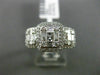 ESTATE WIDE .89CT ROUND & BAGUETTE DIAMOND 18KT WHITE GOLD HALO PROMISE RING