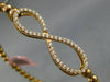 ESTATE .70CT DIAMOND 14KT ROSE GOLD 3D INFINITY FLEXIBLE LOVE BANGLE BRACELET