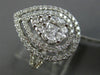 LARGE 18KT WHITE GOLD ENGAGEMENT RING. 3D CLUSTER PEAR SHAPE DOUBLE HALO DESIGN