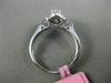 ESTATE .78CT WHITE & YELLOWW DIAMOND 18K WHITE GOLD CLASSIC HALO ENGAGEMENT RING