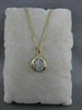 ESTATE DIAMOND 14K WHITE & YELLOW GOLD INVISIBLE MODERN PENDANT  #3666