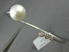 ESTATE .1CT DIAMOND & AAA SOUTH SEA PEARL 18K WHITE GOLD JOURNEY BANGLE BRACELET