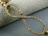 ESTATE .70CT DIAMOND 14KT ROSE GOLD 3D INFINITY FLEXIBLE LOVE BANGLE BRACELET