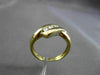 ESTATE .12CT ROUND DIAMOND 14KT YELLOW GOLD 3 STONE CHANNEL INFINITY RING #14197