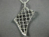 ESTATE .21CT DIAMOND 18K WHITE GOLD 3D OPEN FILIGREE FLOWER FLOATING FUN PENDANT