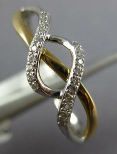 ESTATE .06CT DIAMOND 14KT WHITE AND YELLOW GOLD 3D CLASSIC INFINITY LOVE RING