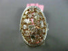 ESTATE EXTRA LARGE 3.78CT FANCY MULTI COLOR DIAMOND 18KT GOLD OVAL INFINITY RING