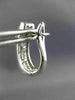 ESTATE WIDE 1.52CT ROUND & BAGUETTE DIAMOND 18KT WHITE GOLD 3D HUGGIE EARRINGS