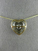 ESTATE .12CT DIAMOND 14KT 2 TONE GOLD CLUSTER HEART DANCING DIAMOND LOVE PENDANT