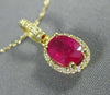 ESTATE 1.02CT DIAMOND & AAA OVAL RUBY 14KT YELLOW GOLD 3D HALO FLOATING PENDANT