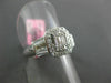 WIDE 1.0CT ROUND & BAGUETTE DIAMOND 18KT WHITE GOLD HALO LUCIDA ENGAGEMENT RING