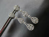 1.57CT DIAMOND 18KT WHITE GOLD 3D CLUSTER INVISIBLE TEAR DROP HANGING EARRINGS